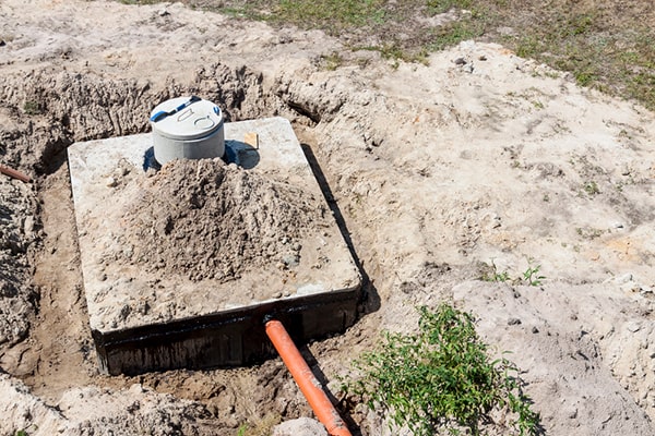 septic tank pumping involves removing the liquid and sludge from the tank, while septic tank cleaning involves removing built-up scum and solid waste